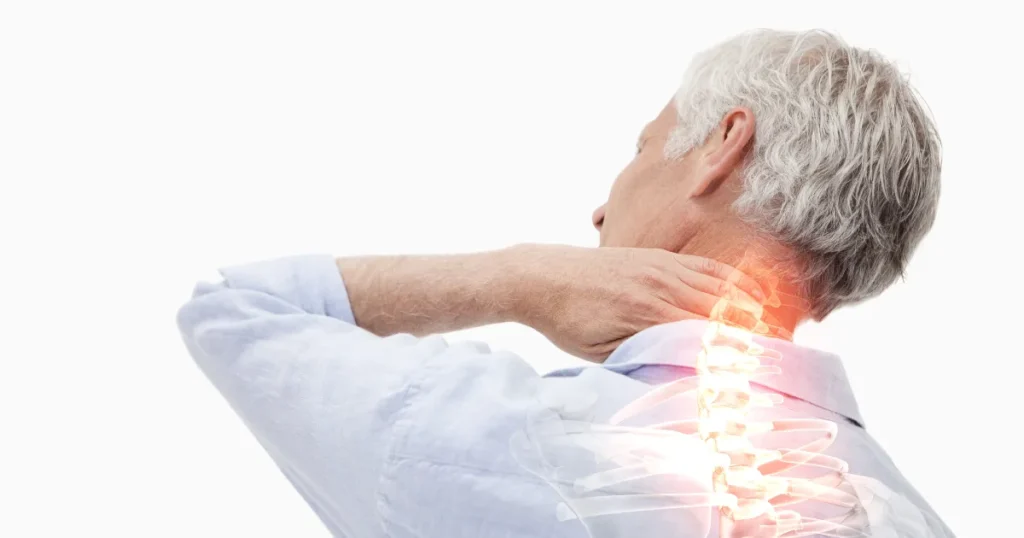 Man holding his neck in pain, symbolizing cervical dystonia and muscle contractions.
