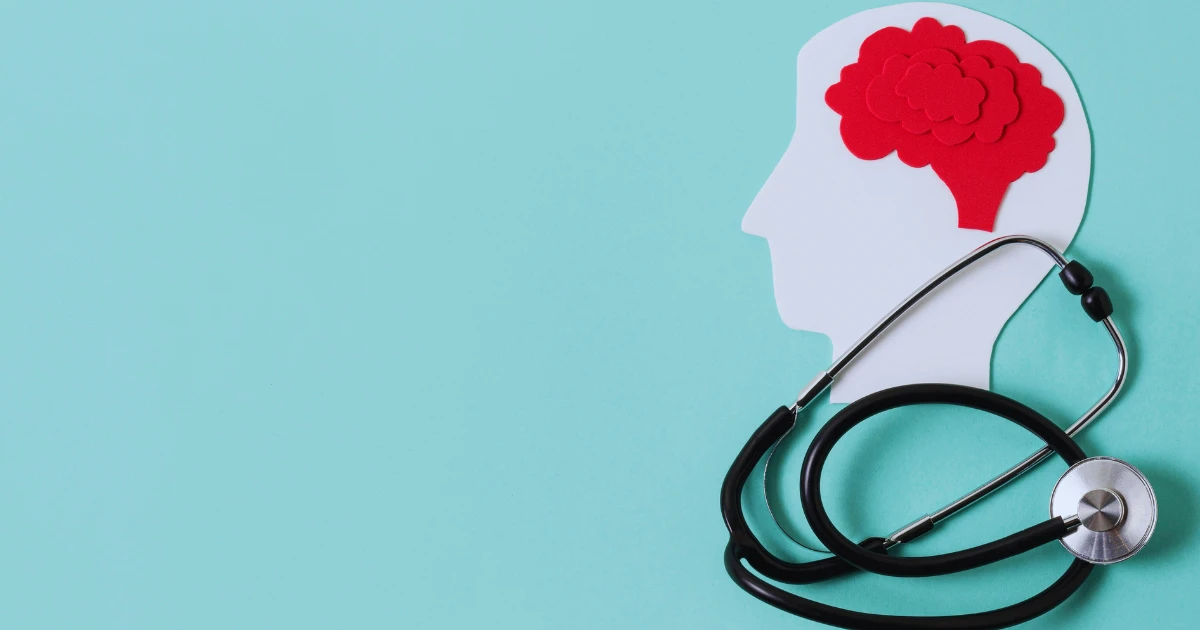 Concept of neurological disorders highlighting the symptoms of neurological disorders, illustrated with a human brain and stethoscope on a blue background.