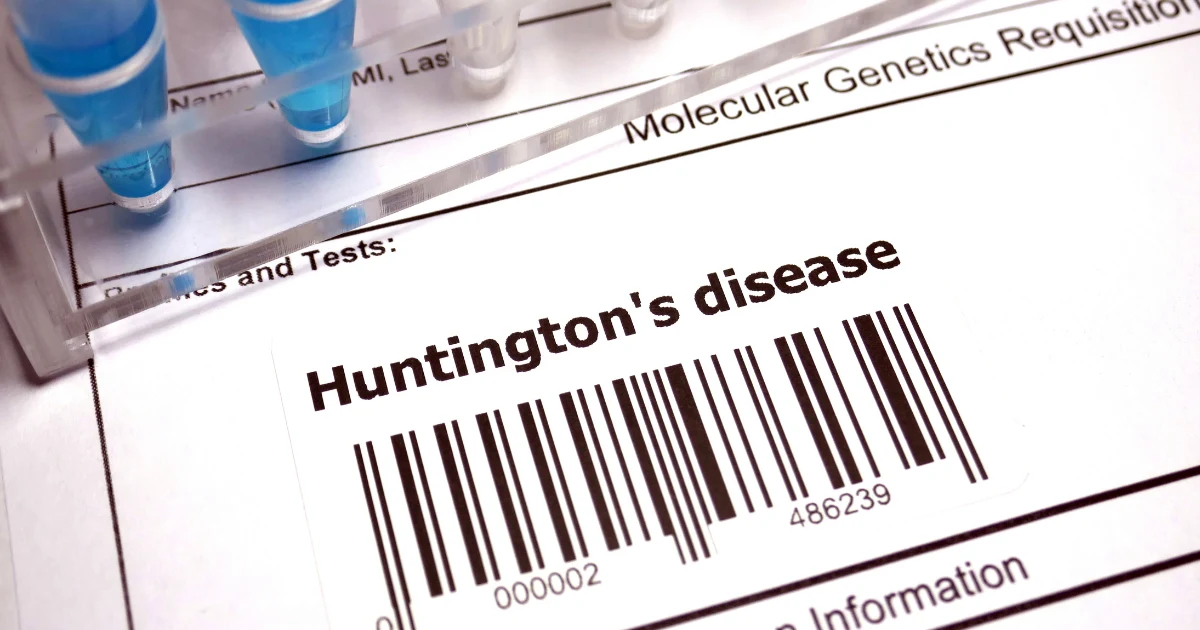 Laboratory form labeled Huntington’s disease testing with barcode and test tubes for genetic analysis.
