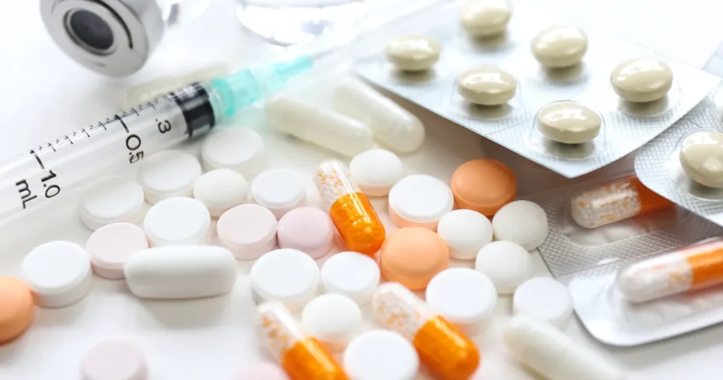 Various PSP medications including tablets, capsules, and syringes used to manage symptoms of Progressive Supranuclear Palsy