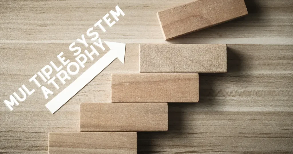 Stages of MSA illustrated with wooden blocks arranged in steps and an upward arrow labeled Multiple System Atrophy.