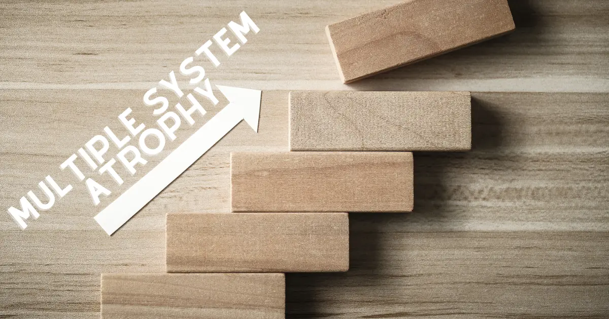 Stages of MSA illustrated with wooden blocks arranged in steps and an upward arrow labeled Multiple System Atrophy.