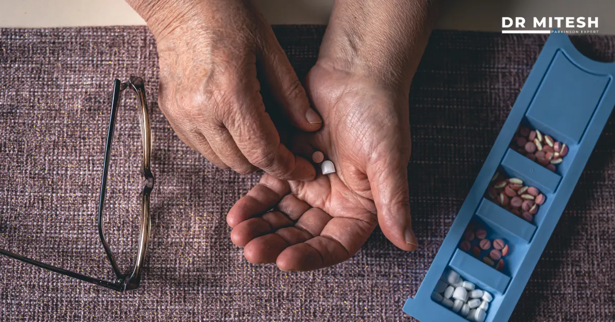A patient holding Parkinson’s medicines, highlighting how medication use may change after DBS surgery